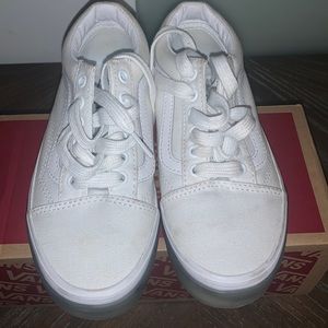 All white Vans “off the wall”